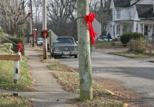 Kendra Peek/kendra.peek@amnews.com Ribbons and wreaths line the end of Adams Street.