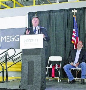 (File photo/Kendra Peek) Luke Durudogan, president of Meggitt Aircraft Braking Systems, speaks to employees and officials at the dedication for Meggitt’s expansion.