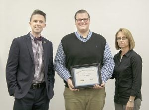 Pictured front left are, Asa James Swan, KYTC Chief of Staff, Wesley Caleb Lowry, scholarship recipient, and Patty Dunaway, KYTC State Highway Engineer.