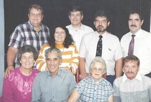 Riley and Nora Marcum with their children in 1992. From left, are, seated, Ora Jane, Riley and Nora, and Clayton Upchurch, widower of Mary Marcum. Standing, Roger, Cynthia, John, Bob and Bill Marcum.