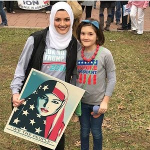 Photo of Lucia Kneisley, right, taken by her mom, Katie, with a new friend she met at the sister march in Lexington. 