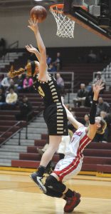 Jeremy Schneider/jeremy.schneider@amnews.com Boyle County's Emmie Harris, left, goes up for a layup as Mercer County's Faith Lake tries to draw the charge during Monday's third quarter.