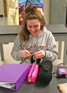 Kendra Peek/kendra.peek@amnews.com Cloe Shear crochets a hat during Shelly Stinnet's class at Danville High School.