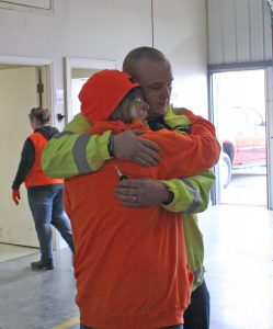 Kendra Peek/kendra.peek@amnews.com Sandra Hasty, mother of Michael Gorley, hugs her son-in-law, Charles Coffey before he heads out to search.