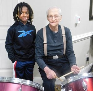 Thaddeus Mays, Mercer County Intermediate student, and James Ramsey, Morning Pointe of Danville resident, bond over their love for percussion.