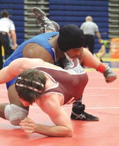 Shannon Young/For The Advocate-Messenger Danville's Don Harris, top, won last week's region title at the 182-pound weight class. He leads five Admirals wrestlers into this week's KHSAA state tournament at Alltech Arena in Lexington.